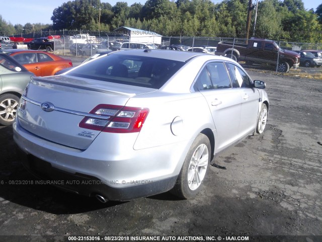 1FAHP2E83HG130307 - 2017 FORD TAURUS SEL SILVER photo 4