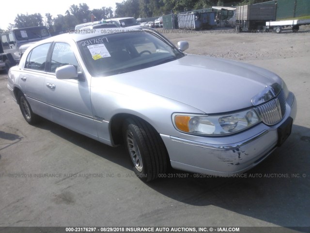 1LNHM83W51Y644033 - 2001 LINCOLN TOWN CAR CARTIER SILVER photo 1