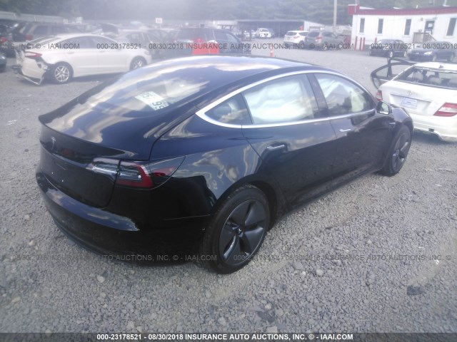 5YJ3E1EA5JF039062 - 2018 TESLA MODEL 3 BLACK photo 4