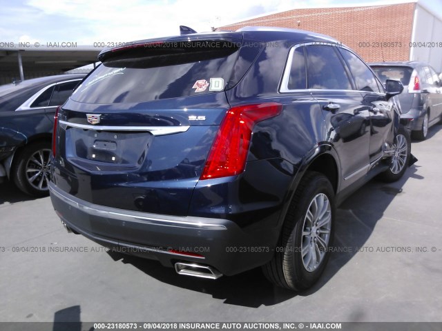 1GYKNBRS8HZ251361 - 2017 CADILLAC XT5 LUXURY BLUE photo 4