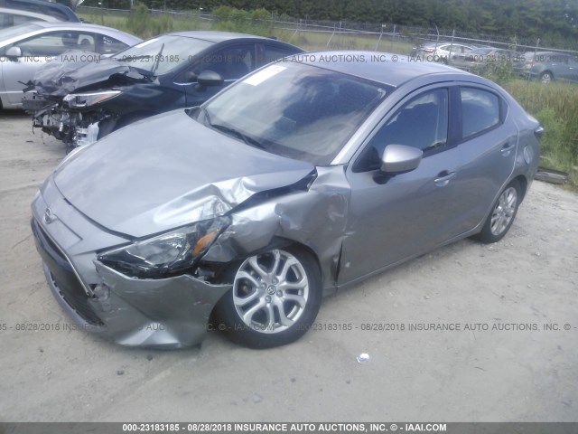 3MYDLBZV8GY144187 - 2016 TOYOTA SCION IA SILVER photo 2