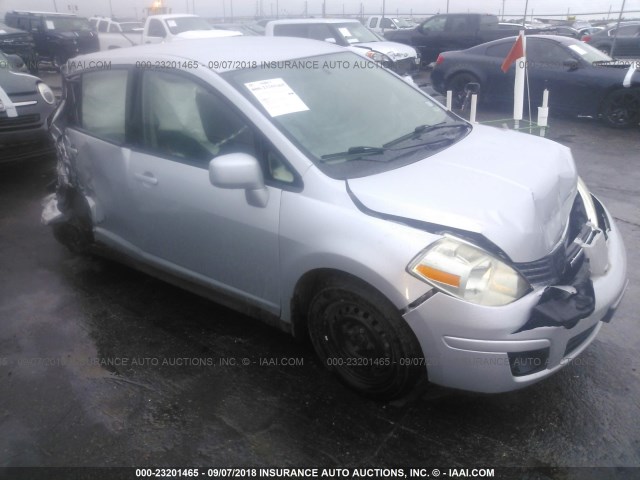 3N1BC13E69L372135 - 2009 NISSAN VERSA S/SL SILVER photo 1