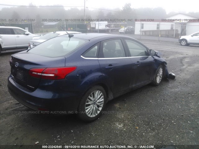 1FADP3J20HL203999 - 2017 FORD FOCUS TITANIUM BLUE photo 4