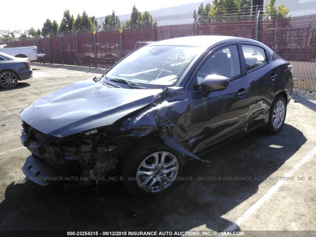 3MYDLBZV3GY106348 - 2016 TOYOTA SCION IA GRAY photo 2