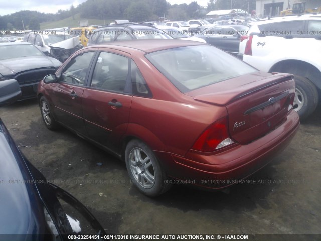 1FAFP3434YW361516 - 2000 FORD FOCUS SE/SE SPORT ORANGE photo 3