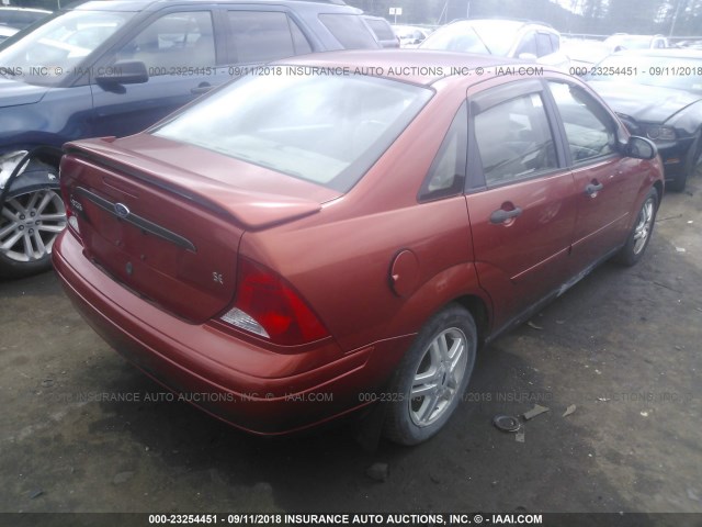 1FAFP3434YW361516 - 2000 FORD FOCUS SE/SE SPORT ORANGE photo 4