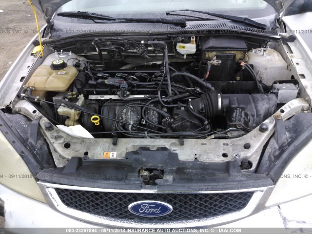 1FAFP34N06W226239 - 2006 FORD FOCUS ZX4 SILVER photo 10