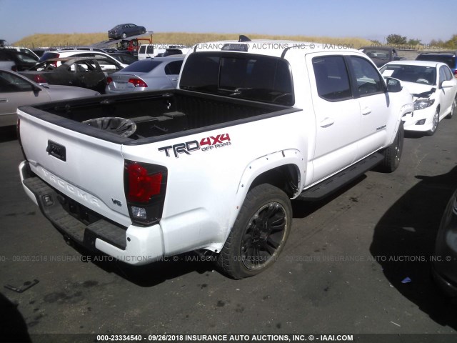 3TMCZ5AN3JM124434 - 2018 TOYOTA TACOMA DBL CAB/SR/TRDSPT/OR/PRO WHITE photo 4