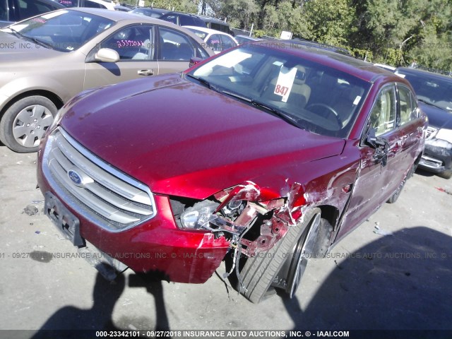 1FAHP2E88GG124842 - 2016 FORD TAURUS SEL RED photo 2