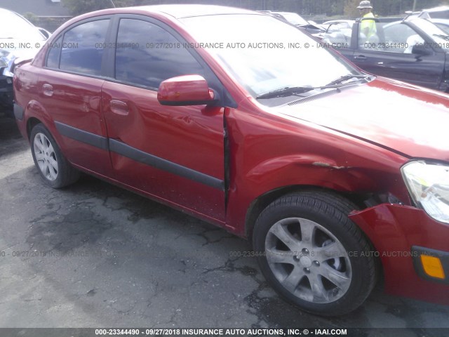 KNADE223896519245 - 2009 KIA RIO LX/SX RED photo 6