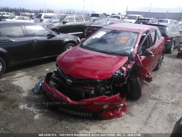 JTNKARJE8JJ559209 - 2018 TOYOTA COROLLA IM RED photo 2