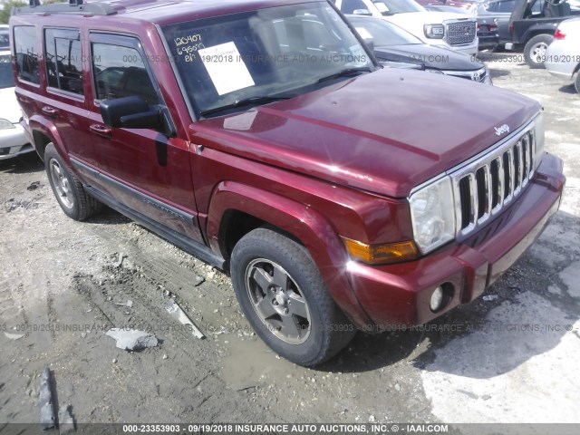 1J8HH48K77C695099 - 2007 JEEP COMMANDER RED photo 1