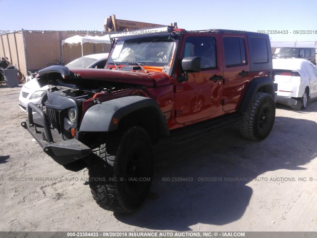 1J4GA39149L739628 - 2009 JEEP WRANGLER UNLIMITED X ORANGE photo 2