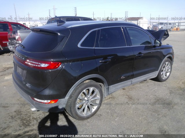 5LMCJ1A9XFUJ05698 - 2015 LINCOLN MKC BLACK photo 4