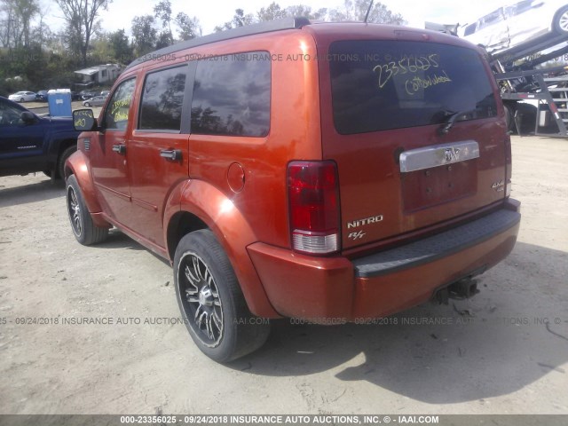 1D8GU58697W724769 - 2007 DODGE NITRO R/T ORANGE photo 3