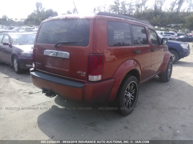 1D8GU58697W724769 - 2007 DODGE NITRO R/T ORANGE photo 4