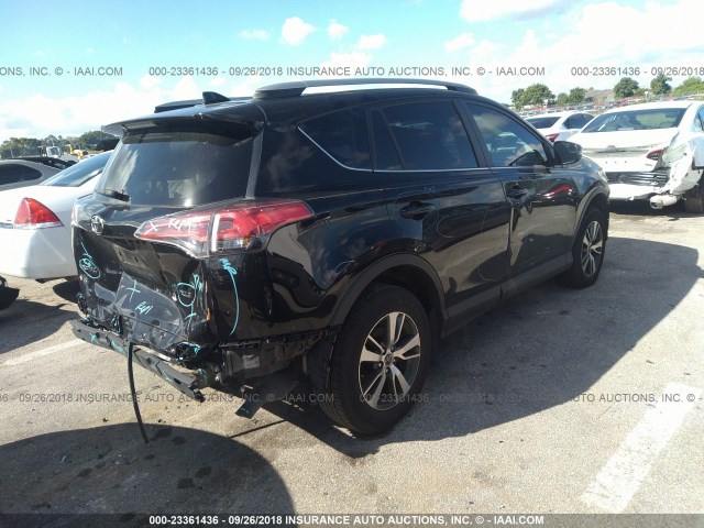 2T3WFREV6HW340746 - 2017 TOYOTA RAV4 XLE BLACK photo 4