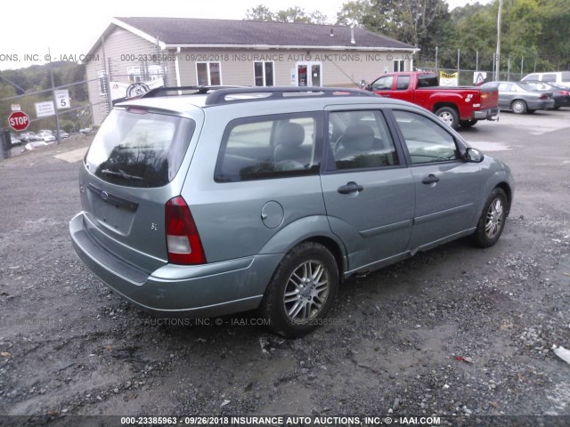 1FAFP36333W121590 - 2003 FORD FOCUS SE/SE SPORT/ZTW TEAL photo 4