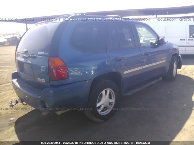 1GKDT13S062124038 - 2006 GMC ENVOY BLUE photo 4