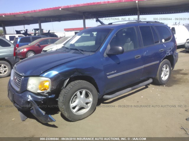 1GKDT13S062124038 - 2006 GMC ENVOY BLUE photo 6