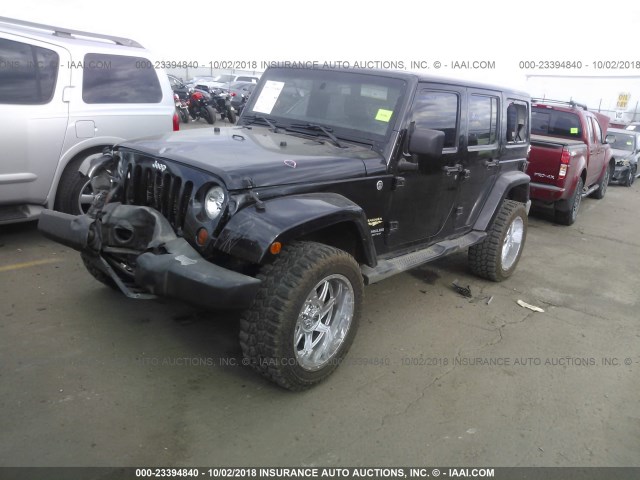 1C4HJWEG4CL205414 - 2012 JEEP WRANGLER UNLIMITE SAHARA BLACK photo 2