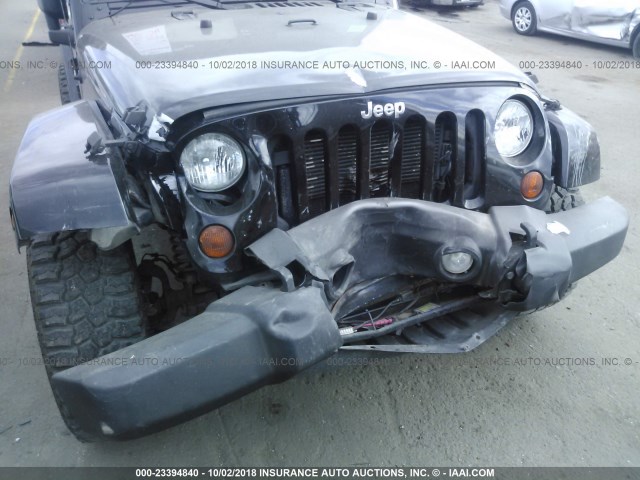 1C4HJWEG4CL205414 - 2012 JEEP WRANGLER UNLIMITE SAHARA BLACK photo 6