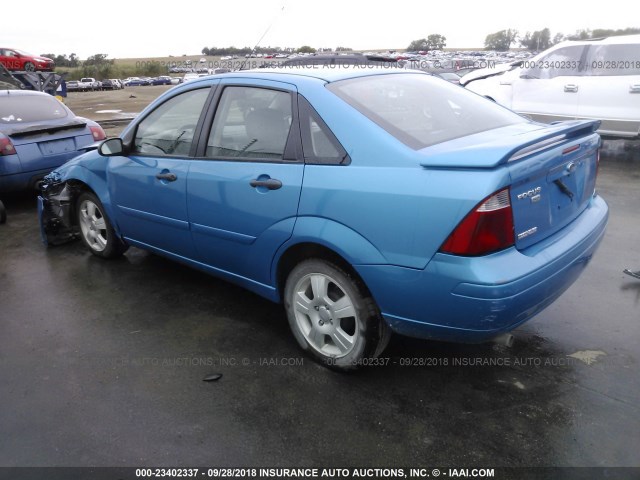 1FAFP34NX7W142298 - 2007 FORD FOCUS ZX4/S/SE/SES BLUE photo 3