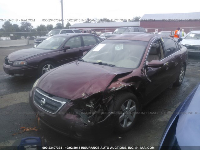 1N4AL11D72C144008 - 2002 NISSAN ALTIMA S/SL RED photo 2