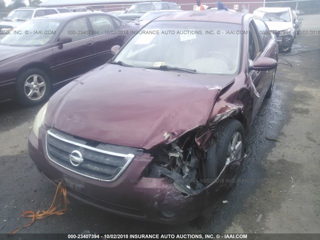 1N4AL11D72C144008 - 2002 NISSAN ALTIMA S/SL RED photo 6