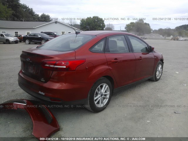 1FADP3FE5JL320440 - 2018 FORD FOCUS SE ORANGE photo 4