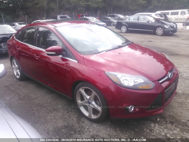 1FAHP3J23CL231287 - 2012 FORD FOCUS TITANIUM RED photo 1