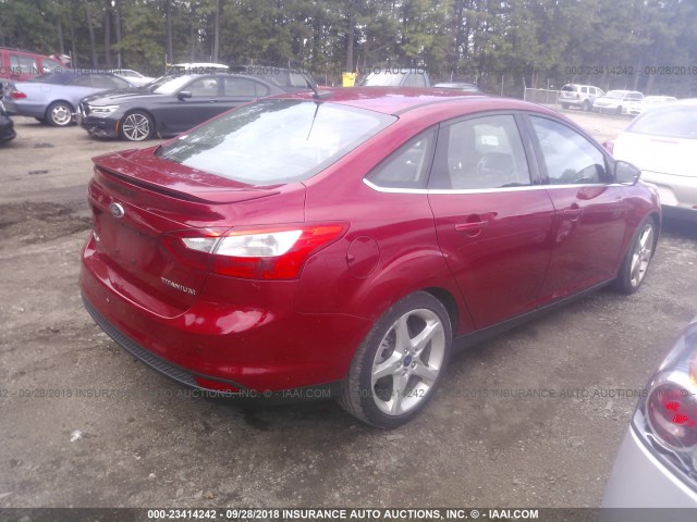 1FAHP3J23CL231287 - 2012 FORD FOCUS TITANIUM RED photo 4