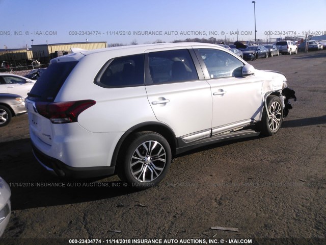 JA4AZ3A31JZ038381 - 2018 MITSUBISHI OUTLANDER SE/SEL WHITE photo 4