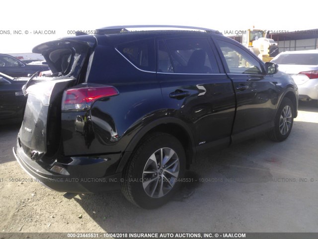 JTMRJREV9JD214864 - 2018 TOYOTA RAV4 HV LE PLUS/XLE BLACK photo 4