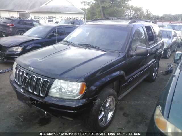 1J8GW68J73C554211 - 2003 JEEP GRAND CHEROKEE OVERLAND BLACK photo 2