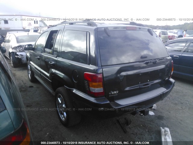 1J8GW68J73C554211 - 2003 JEEP GRAND CHEROKEE OVERLAND BLACK photo 3