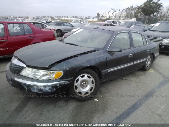 1LNHM97V12Y700705 - 2002 LINCOLN CONTINENTAL  GREEN photo 2