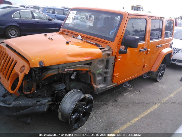 1C4BJWEG9DL528008 - 2013 JEEP WRANGLER UNLIMITE SAHARA ORANGE photo 2