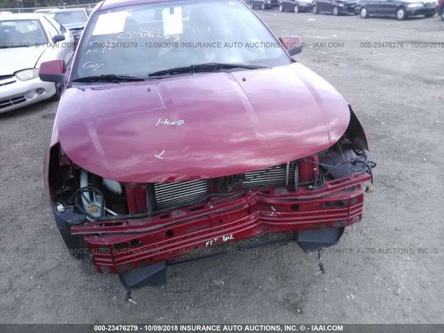 1FAHP36N79W151369 - 2009 FORD FOCUS SES RED photo 6