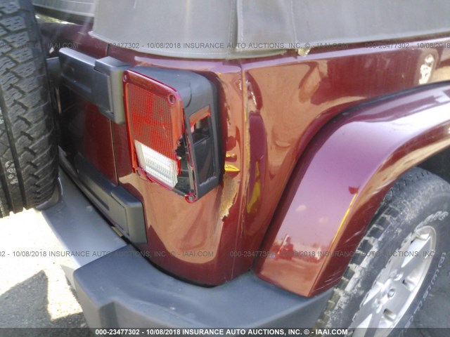 1J4GA59119L727576 - 2009 JEEP WRANGLER UNLIMITE SAHARA MAROON photo 6