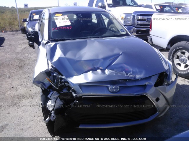 3MYDLBZV6GY121474 - 2016 TOYOTA SCION IA SILVER photo 6