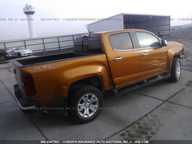 1GCGTCENXH1316295 - 2017 CHEVROLET COLORADO LT ORANGE photo 4