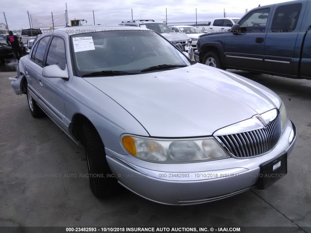 1LNFM97V4WY625401 - 1998 LINCOLN CONTINENTAL  SILVER photo 1