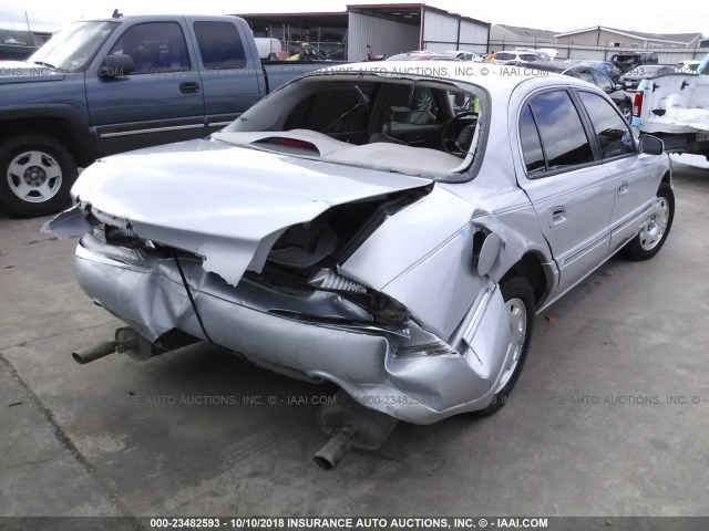 1LNFM97V4WY625401 - 1998 LINCOLN CONTINENTAL  SILVER photo 4