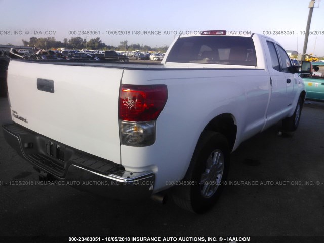 5TFTY5F12AX006913 - 2010 TOYOTA TUNDRA DOUBLE CAB SR5 WHITE photo 4