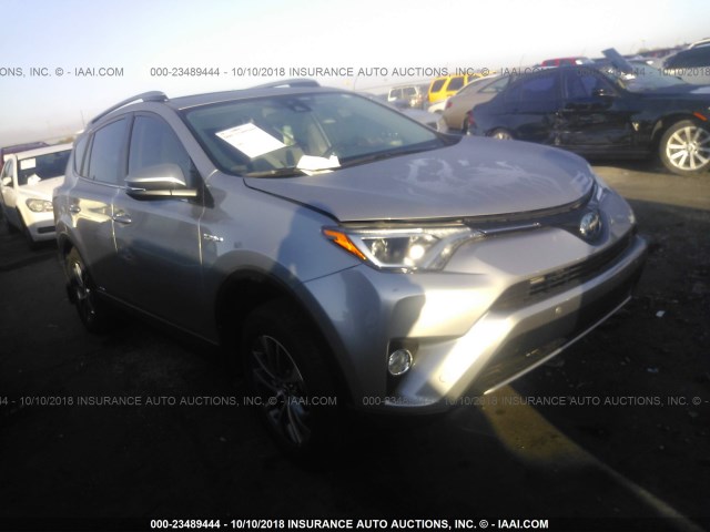 JTMRJREV5JD190787 - 2018 TOYOTA RAV4 HV LE PLUS/XLE SILVER photo 1