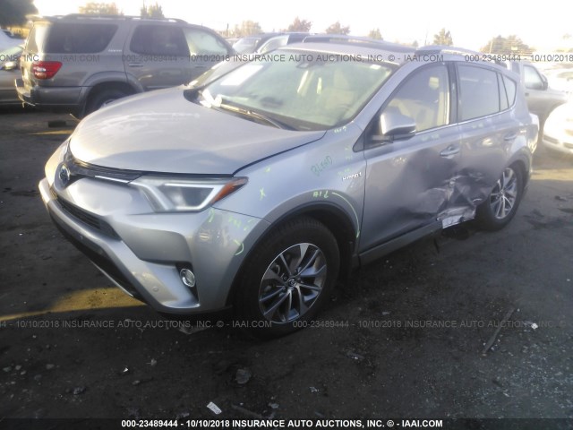 JTMRJREV5JD190787 - 2018 TOYOTA RAV4 HV LE PLUS/XLE SILVER photo 2