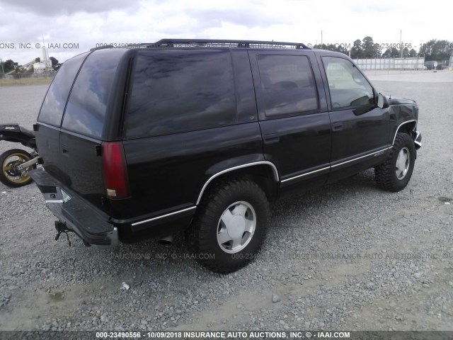 1GNEK13R4VJ301394 - 1997 CHEVROLET TAHOE K1500 BLACK photo 4