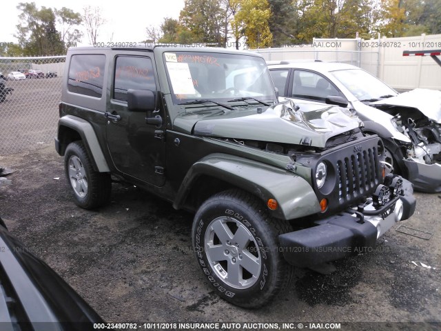 1J4FA54108L540556 - 2008 JEEP WRANGLER SAHARA GREEN photo 1