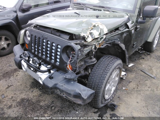 1J4FA54108L540556 - 2008 JEEP WRANGLER SAHARA GREEN photo 6